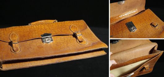 Old shoolbag made of brown leather