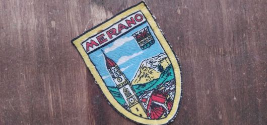 Old fabric badge merano