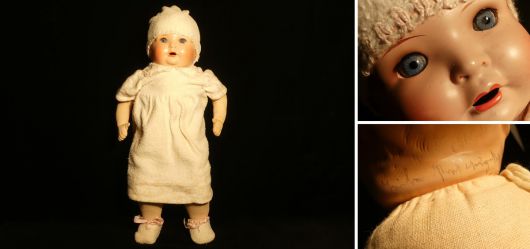 Baby doll with sleeping eyes around 1920