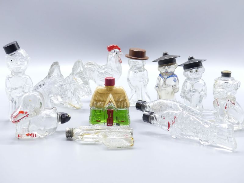 Sammlung figürliche Parfüm-Flaschen