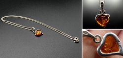 Beautiful amber pendant in the shape of a heart