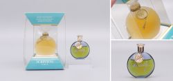 Worth  Je Reviens in the Lalique star flacon with original box and miniature (30ml & 1/4 Fl Oz), 1950s to 1980s.
