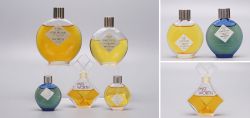 Worth  5 Perfume Bottles Je Reviens and Miss Worth, 1940s to 1970s, Including Lalique-Embossed Bottles, Miniatures